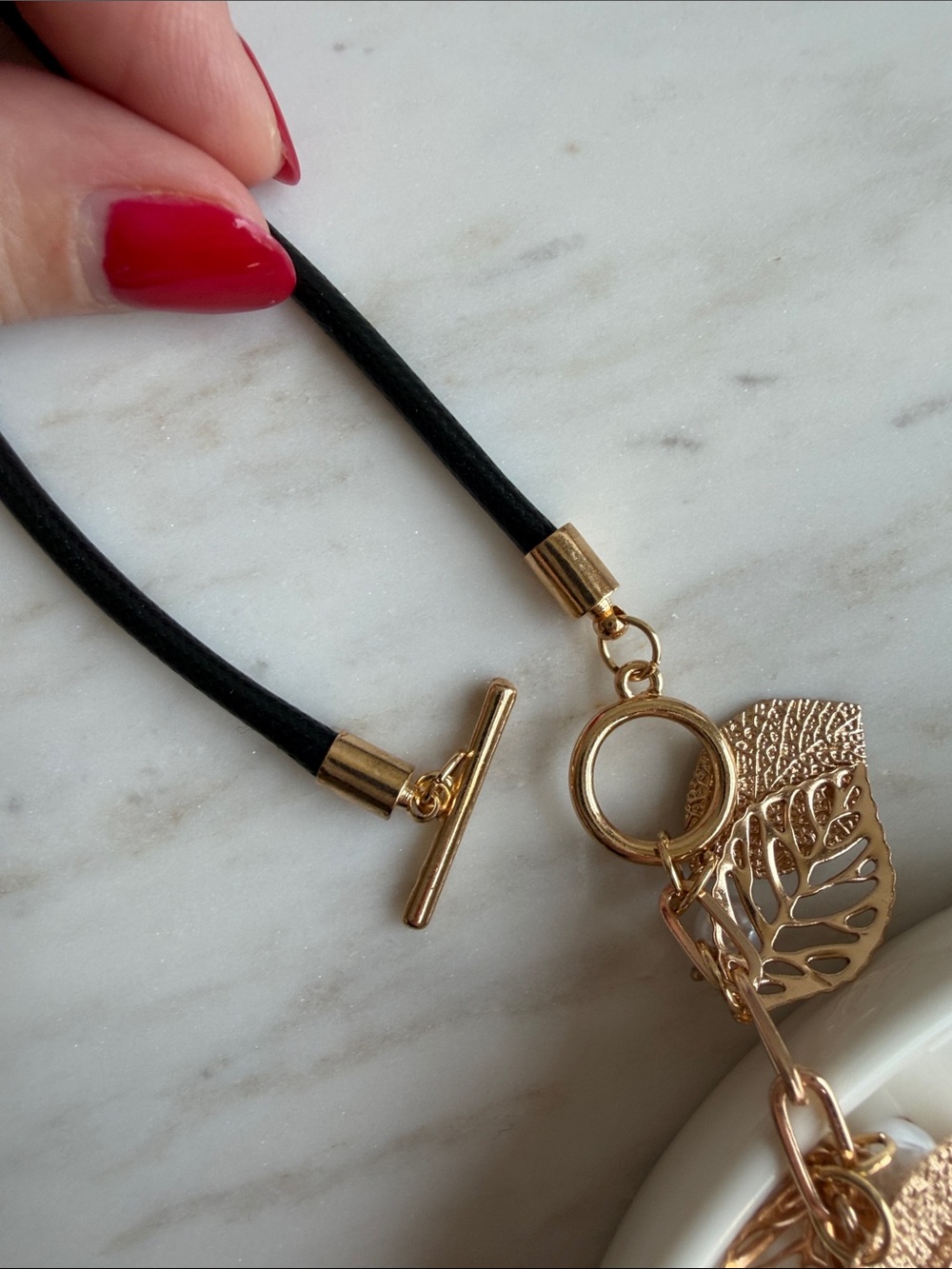 Gold Metal Leaf Cascade Pendant Necklace with Black Cord- Dainty , Feminine - Picture 3 of 5